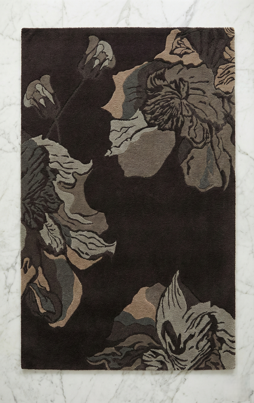 Hand-tufted black carpet texture detail